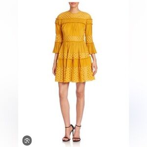 CINQ A SEPT OCTAVIA RUFFLE PANELED FIT AND FLATE DRESS IN GOLDENROD SIZE 4